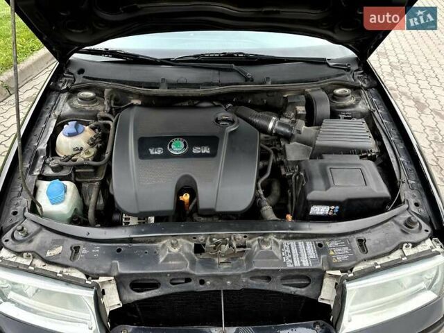 Черный Шкода Октавия, объемом двигателя 1.6 л и пробегом 224 тыс. км за 4999 $, фото 9 на Automoto.ua