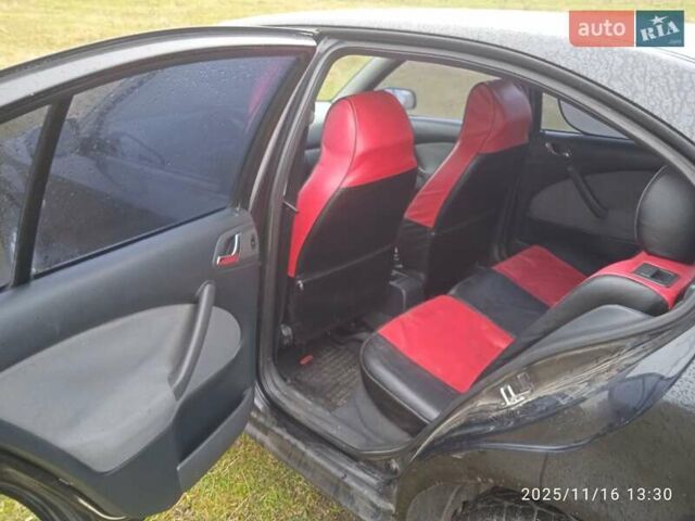 Черный Шкода Октавия, объемом двигателя 1.6 л и пробегом 410 тыс. км за 3200 $, фото 5 на Automoto.ua