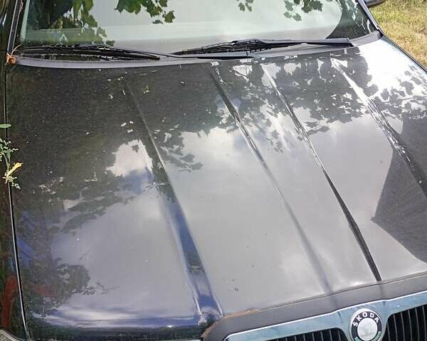 Шкода Октавия 2003 в Славянске на Automoto.ua Черный Шкода Октавия, объемом двигателя 2 л и пробегом 245 тыс. км за 5200 $, фото 2 на Automoto.ua