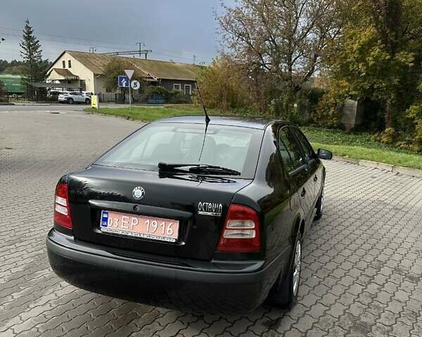 Черный Шкода Октавия, объемом двигателя 1.6 л и пробегом 224 тыс. км за 4999 $, фото 3 на Automoto.ua
