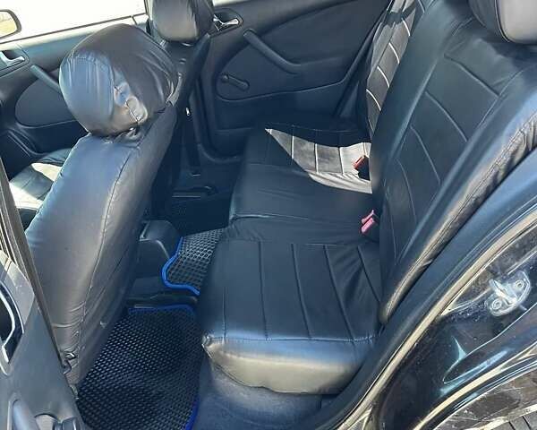 Черный Шкода Октавия, объемом двигателя 1.6 л и пробегом 225 тыс. км за 4500 $, фото 8 на Automoto.ua
