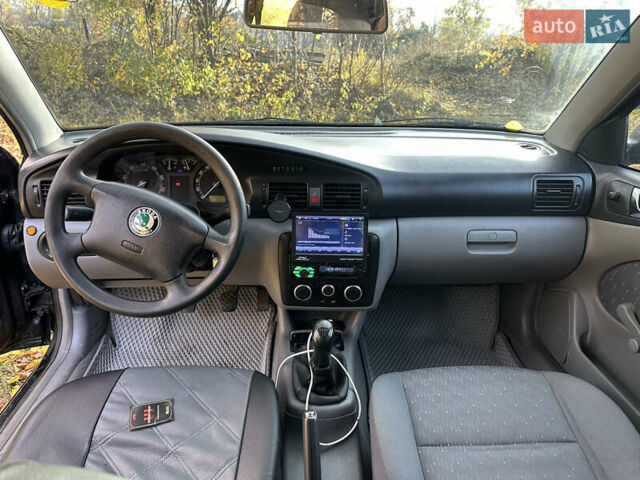 Черный Шкода Октавия, объемом двигателя 1.6 л и пробегом 350 тыс. км за 4200 $, фото 8 на Automoto.ua