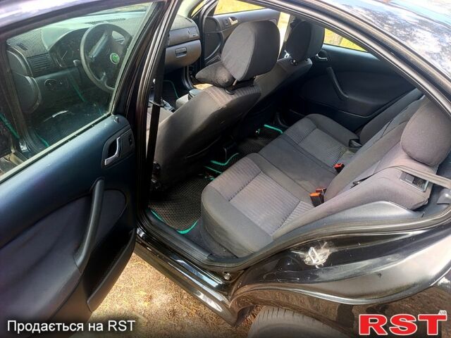 Черный Шкода Октавия, объемом двигателя 1.9 л и пробегом 328 тыс. км за 3300 $, фото 9 на Automoto.ua