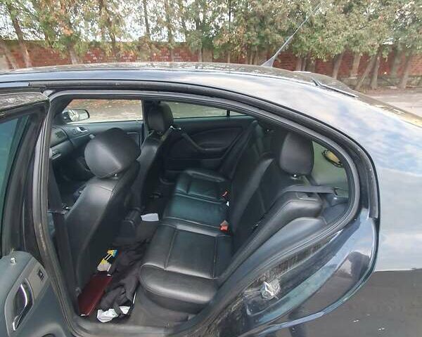 Черный Шкода Октавия, объемом двигателя 1.8 л и пробегом 281 тыс. км за 5500 $, фото 4 на Automoto.ua