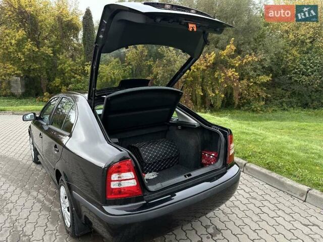 Черный Шкода Октавия, объемом двигателя 1.6 л и пробегом 224 тыс. км за 4999 $, фото 8 на Automoto.ua