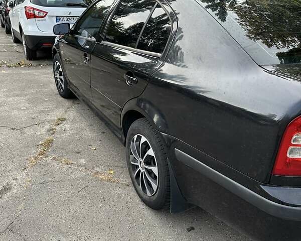 Черный Шкода Октавия, объемом двигателя 1.6 л и пробегом 192 тыс. км за 4100 $, фото 3 на Automoto.ua