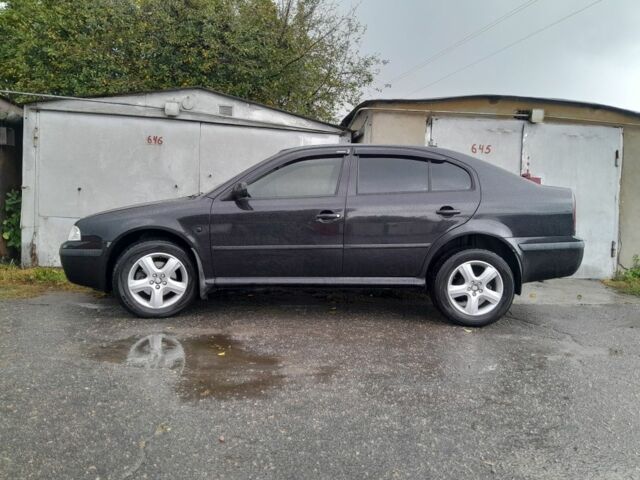 Черный Шкода Октавия, объемом двигателя 2 л и пробегом 250 тыс. км за 5000 $, фото 1 на Automoto.ua