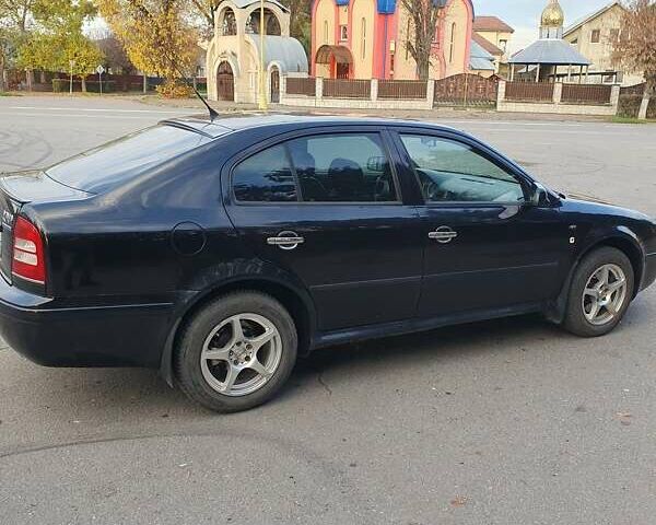 Черный Шкода Октавия, объемом двигателя 1.8 л и пробегом 281 тыс. км за 5500 $, фото 8 на Automoto.ua