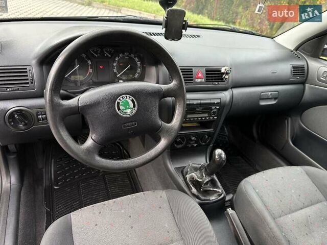 Черный Шкода Октавия, объемом двигателя 1.6 л и пробегом 224 тыс. км за 4999 $, фото 7 на Automoto.ua