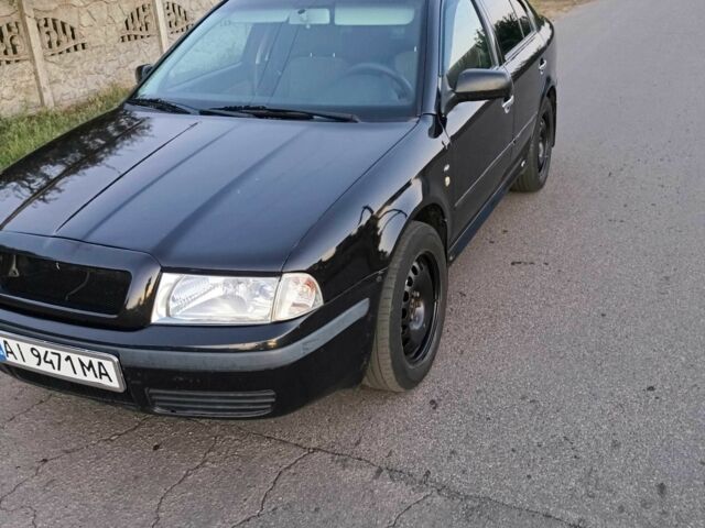 Черный Шкода Октавия, объемом двигателя 2 л и пробегом 320 тыс. км за 3450 $, фото 4 на Automoto.ua