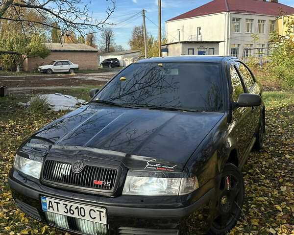 Черный Шкода Октавия, объемом двигателя 1.6 л и пробегом 350 тыс. км за 4200 $, фото 2 на Automoto.ua