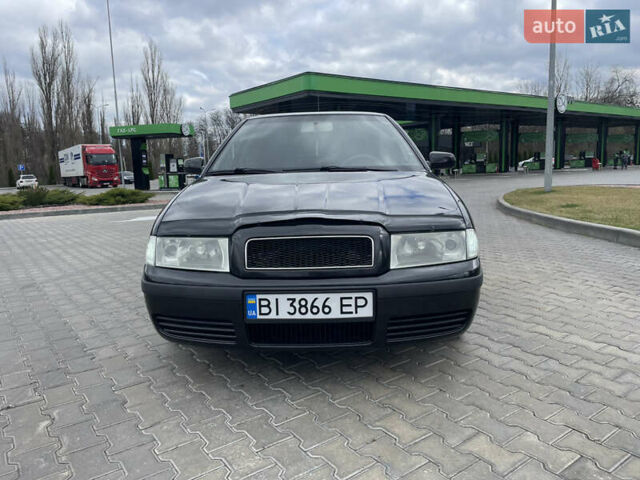 Черный Шкода Октавия, объемом двигателя 2 л и пробегом 261 тыс. км за 6000 $, фото 10 на Automoto.ua