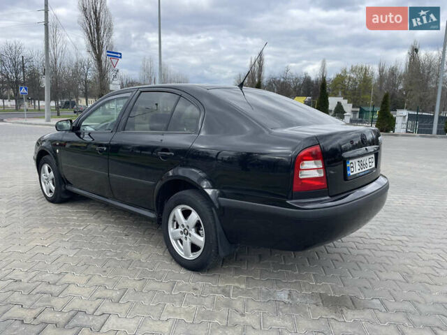 Черный Шкода Октавия, объемом двигателя 2 л и пробегом 261 тыс. км за 6000 $, фото 13 на Automoto.ua