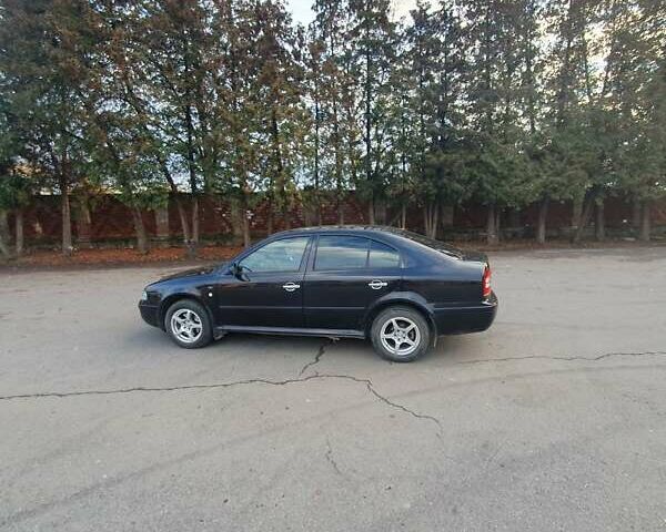 Черный Шкода Октавия, объемом двигателя 1.8 л и пробегом 281 тыс. км за 5500 $, фото 10 на Automoto.ua