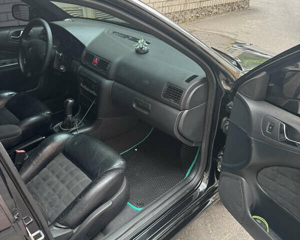 Черный Шкода Октавия, объемом двигателя 1.78 л и пробегом 330 тыс. км за 6000 $, фото 4 на Automoto.ua