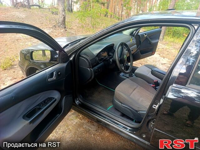 Черный Шкода Октавия, объемом двигателя 1.9 л и пробегом 328 тыс. км за 3300 $, фото 8 на Automoto.ua