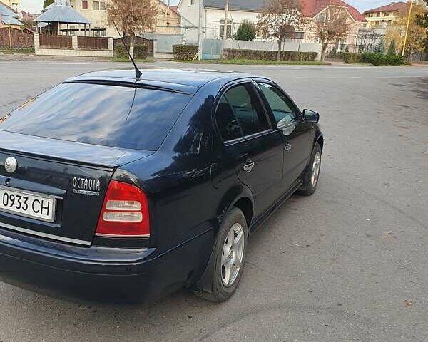 Черный Шкода Октавия, объемом двигателя 1.8 л и пробегом 281 тыс. км за 5500 $, фото 2 на Automoto.ua