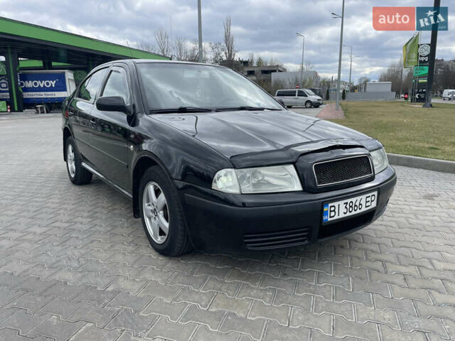 Черный Шкода Октавия, объемом двигателя 2 л и пробегом 261 тыс. км за 6000 $, фото 12 на Automoto.ua