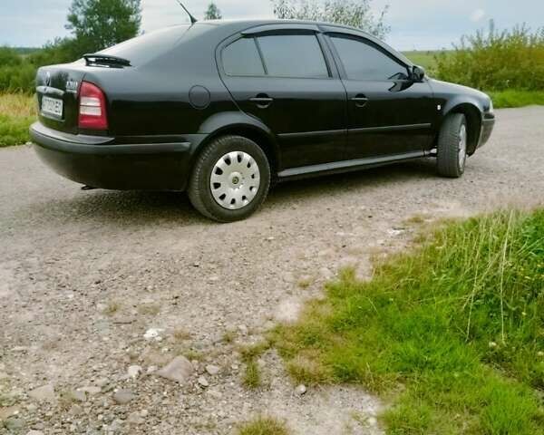 Чорний Шкода Октавія, об'ємом двигуна 1.6 л та пробігом 163 тис. км за 4800 $, фото 7 на Automoto.ua