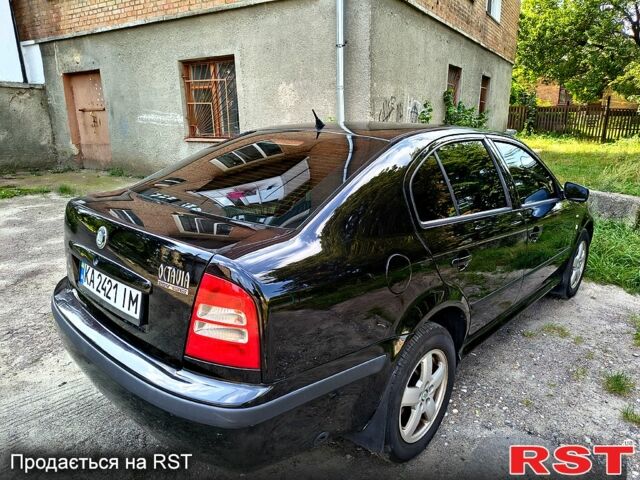 Черный Шкода Октавия, объемом двигателя 1.8 л и пробегом 399 тыс. км за 5200 $, фото 4 на Automoto.ua