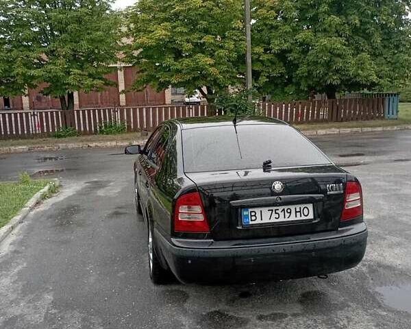 Черный Шкода Октавия, объемом двигателя 1.6 л и пробегом 314 тыс. км за 5000 $, фото 3 на Automoto.ua