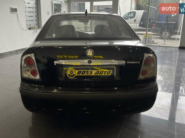 Черный Шкода Октавия, объемом двигателя 1.6 л и пробегом 279 тыс. км за 4700 $, фото 5 на Automoto.ua