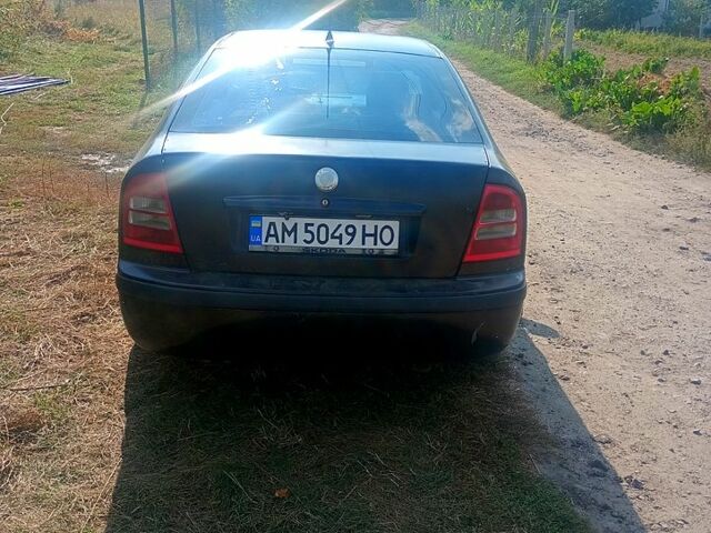 Черный Шкода Октавия, объемом двигателя 1.8 л и пробегом 200 тыс. км за 3800 $, фото 2 на Automoto.ua