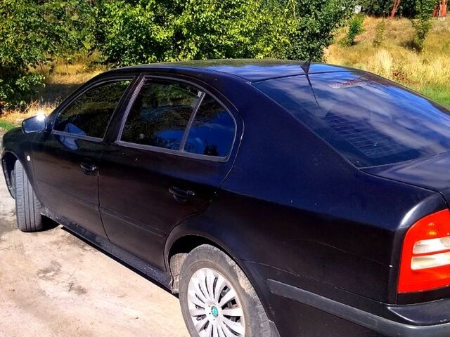 Черный Шкода Октавия, объемом двигателя 2 л и пробегом 400 тыс. км за 3850 $, фото 4 на Automoto.ua