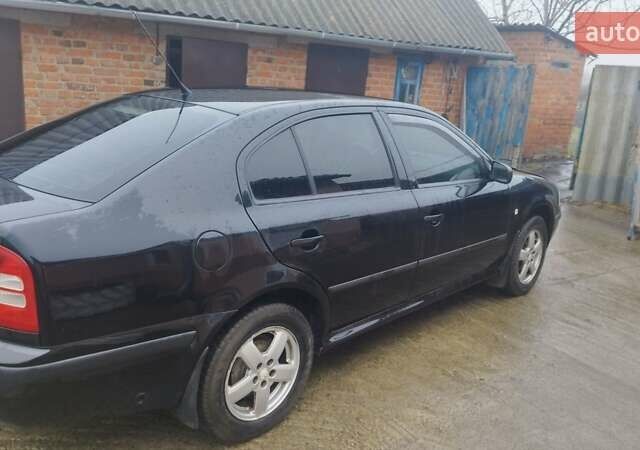 Черный Шкода Октавия, объемом двигателя 1.6 л и пробегом 170 тыс. км за 4500 $, фото 4 на Automoto.ua