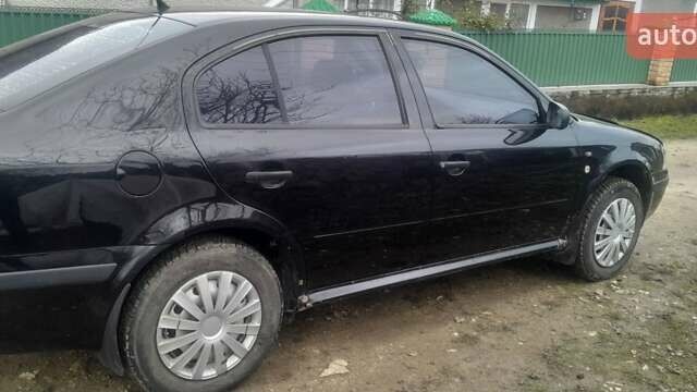 Черный Шкода Октавия, объемом двигателя 1.6 л и пробегом 278 тыс. км за 3800 $, фото 2 на Automoto.ua