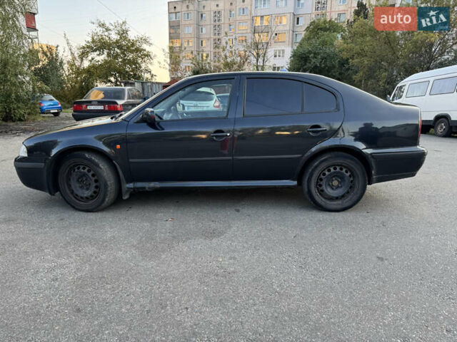 Черный Шкода Октавия, объемом двигателя 2 л и пробегом 424 тыс. км за 3500 $, фото 2 на Automoto.ua