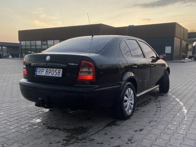 Черный Шкода Октавия, объемом двигателя 1.9 л и пробегом 445 тыс. км за 2000 $, фото 2 на Automoto.ua