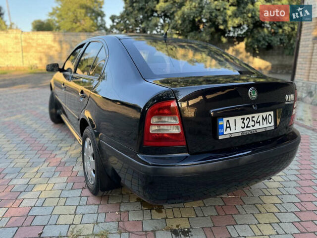 Чорний Шкода Октавія, об'ємом двигуна 1.6 л та пробігом 226 тис. км за 4700 $, фото 4 на Automoto.ua