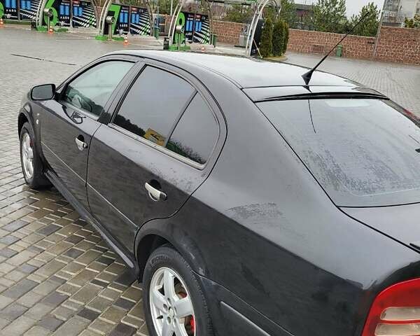 Черный Шкода Октавия, объемом двигателя 1.8 л и пробегом 340 тыс. км за 5300 $, фото 4 на Automoto.ua