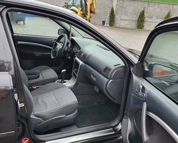 Черный Шкода Октавия, объемом двигателя 1.8 л и пробегом 340 тыс. км за 5300 $, фото 8 на Automoto.ua