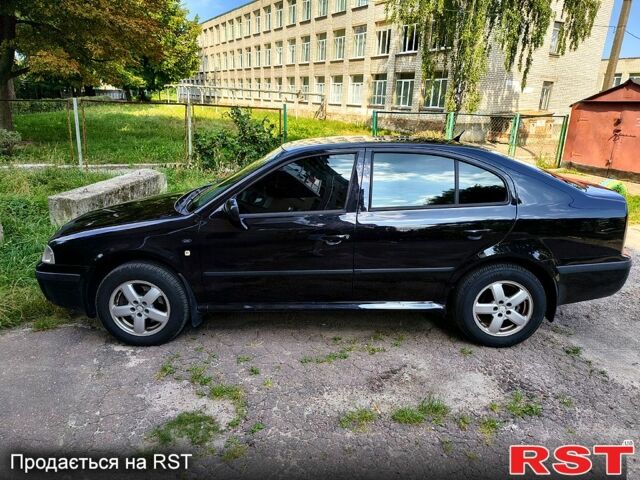Черный Шкода Октавия, объемом двигателя 1.8 л и пробегом 399 тыс. км за 5200 $, фото 2 на Automoto.ua
