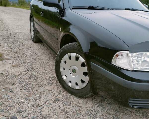 Чорний Шкода Октавія, об'ємом двигуна 1.6 л та пробігом 163 тис. км за 4800 $, фото 3 на Automoto.ua