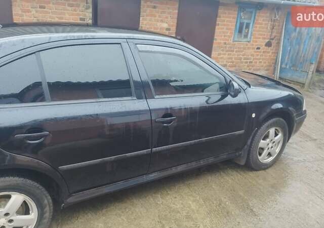 Черный Шкода Октавия, объемом двигателя 1.6 л и пробегом 170 тыс. км за 4500 $, фото 2 на Automoto.ua