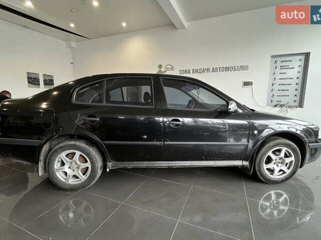 Черный Шкода Октавия, объемом двигателя 1.6 л и пробегом 279 тыс. км за 4700 $, фото 7 на Automoto.ua