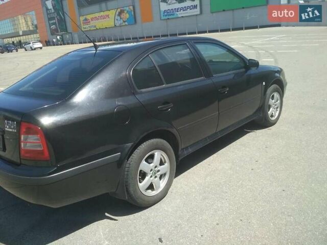 Черный Шкода Октавия, объемом двигателя 2 л и пробегом 200 тыс. км за 5200 $, фото 2 на Automoto.ua