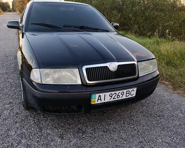 Черный Шкода Октавия, объемом двигателя 1.6 л и пробегом 352 тыс. км за 3400 $, фото 1 на Automoto.ua