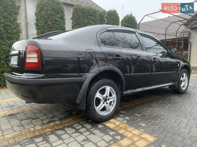 Черный Шкода Октавия, объемом двигателя 1.6 л и пробегом 272 тыс. км за 3650 $, фото 24 на Automoto.ua