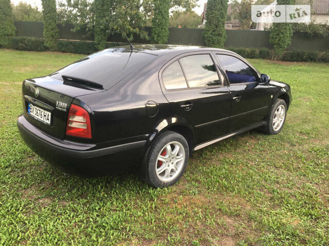 Черный Шкода Октавия, объемом двигателя 1.6 л и пробегом 165 тыс. км за 4700 $, фото 4 на Automoto.ua