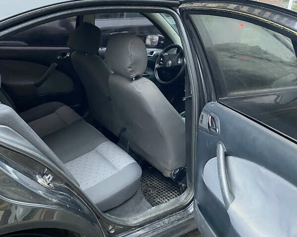 Черный Шкода Октавия, объемом двигателя 1.6 л и пробегом 359 тыс. км за 5100 $, фото 10 на Automoto.ua