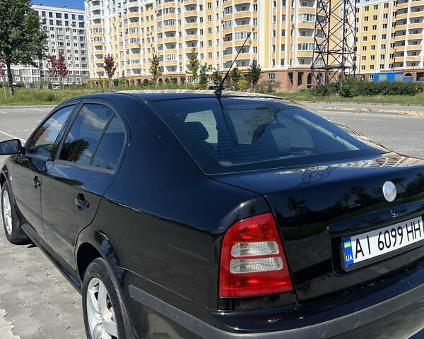 Чорний Шкода Октавія, об'ємом двигуна 1.8 л та пробігом 291 тис. км за 5300 $, фото 5 на Automoto.ua