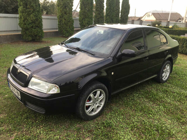 Черный Шкода Октавия, объемом двигателя 1.6 л и пробегом 165 тыс. км за 4700 $, фото 6 на Automoto.ua