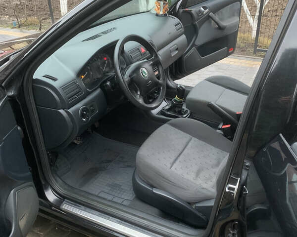 Черный Шкода Октавия, объемом двигателя 1.6 л и пробегом 272 тыс. км за 3650 $, фото 17 на Automoto.ua