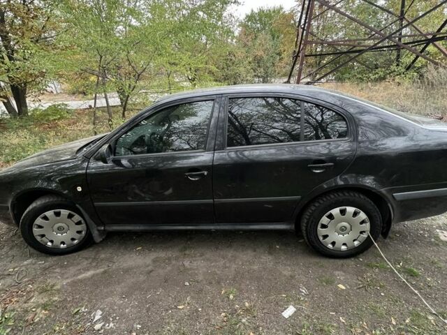 Черный Шкода Октавия, объемом двигателя 1.8 л и пробегом 210 тыс. км за 3799 $, фото 5 на Automoto.ua