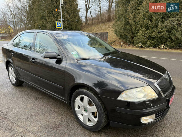 Черный Шкода Октавия, объемом двигателя 1.6 л и пробегом 210 тыс. км за 5450 $, фото 23 на Automoto.ua