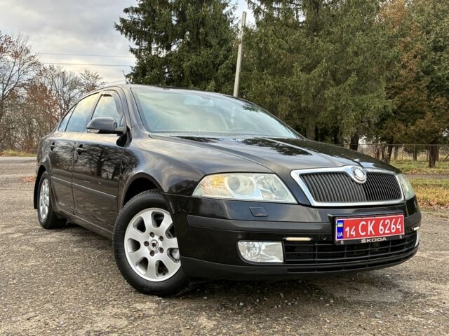 Черный Шкода Октавия, объемом двигателя 1.6 л и пробегом 180 тыс. км за 5750 $, фото 2 на Automoto.ua